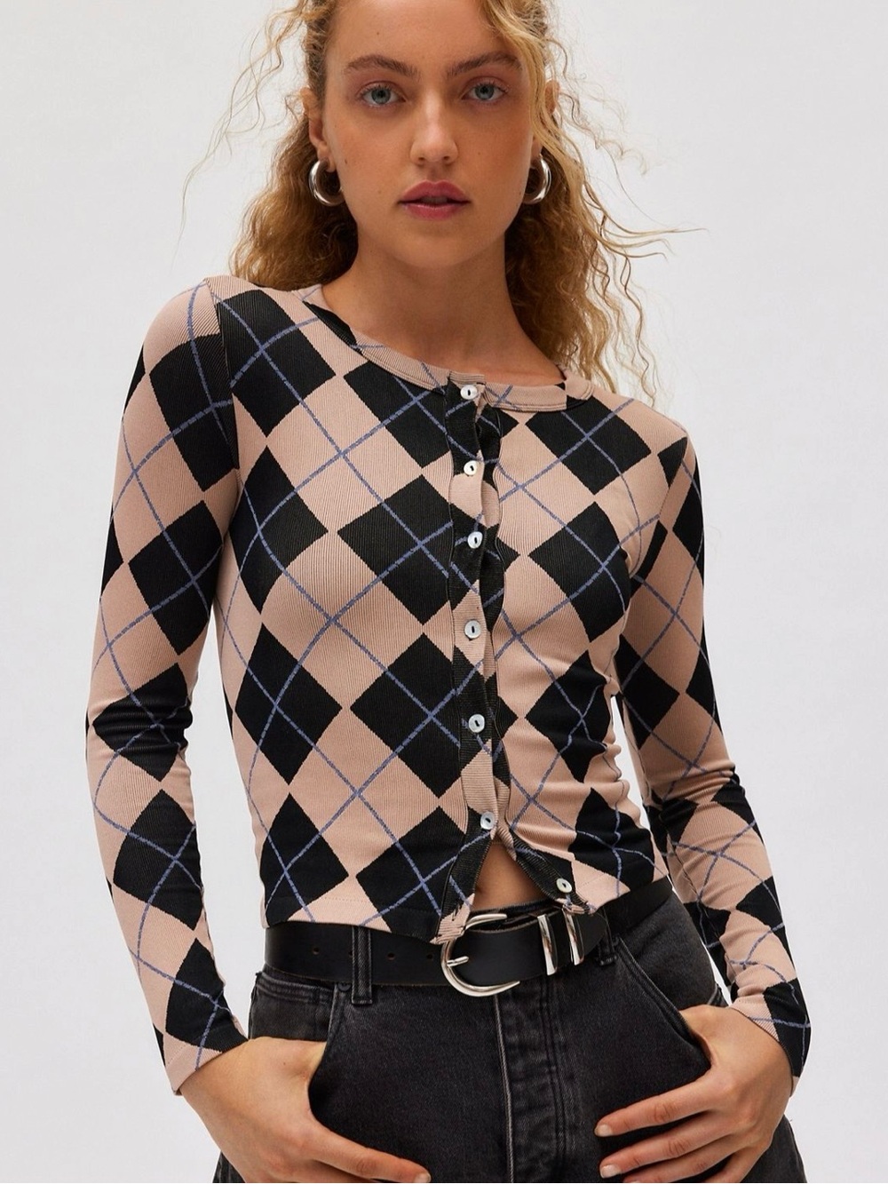 Qut From Under Jacquard Seamless Knit
Cardigan from Urban Outfitters.